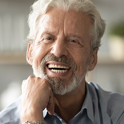 man smiling after getting dentures in Groveport